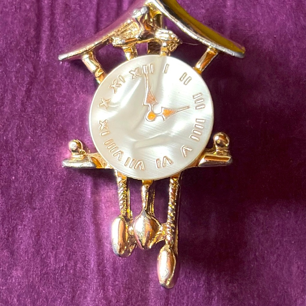1960s mother-of-pearl cuckoo clock brooch